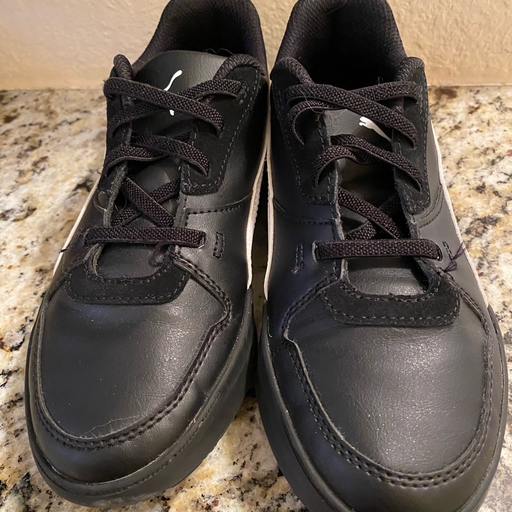 Black and white kids size 3 slip on puma tennis shoes